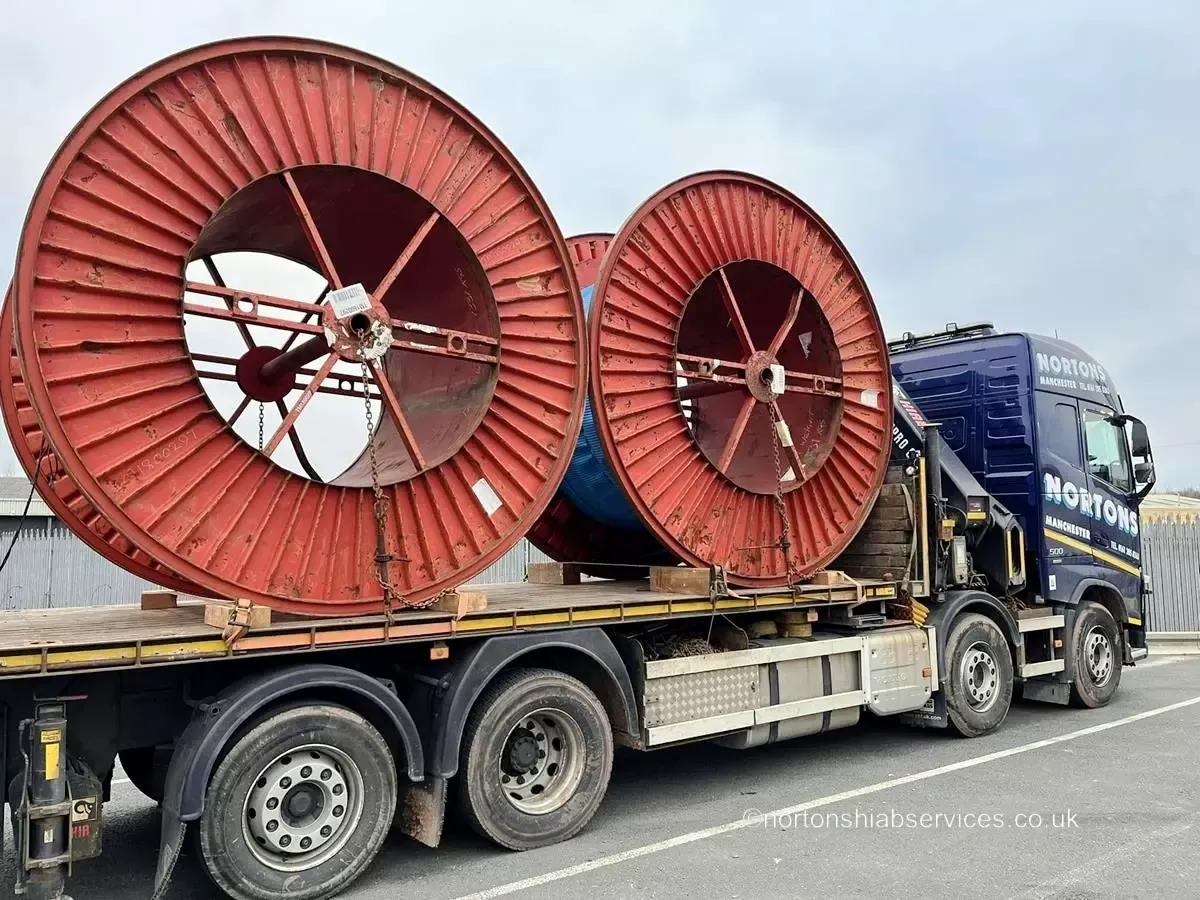Large cable drums loaded on a Nortons hiab lorry