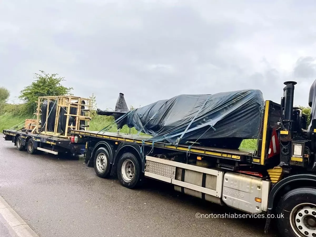 Large steel tank secured on a Nortons trailer for an abnormal load movement