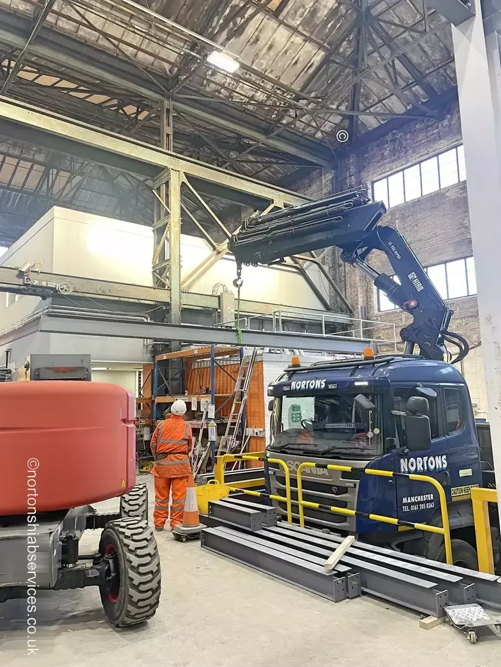 Steel beam slung and tagged ready to lift