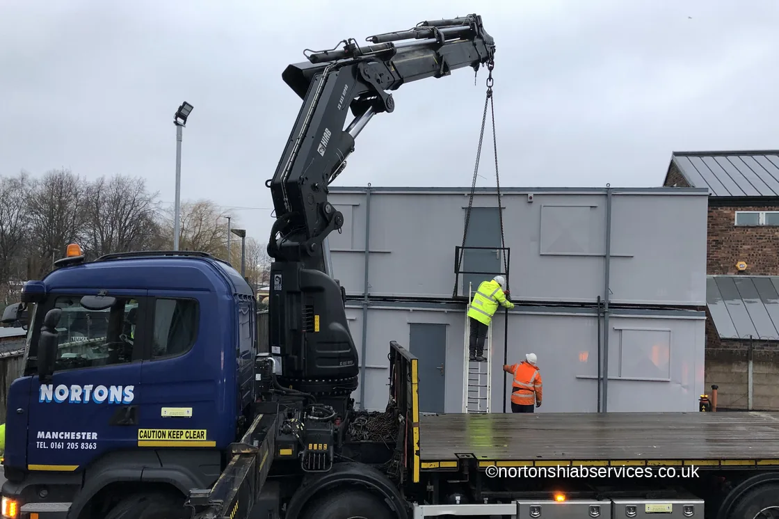 Nortons crew landing a full-size anti-vandal unit on site