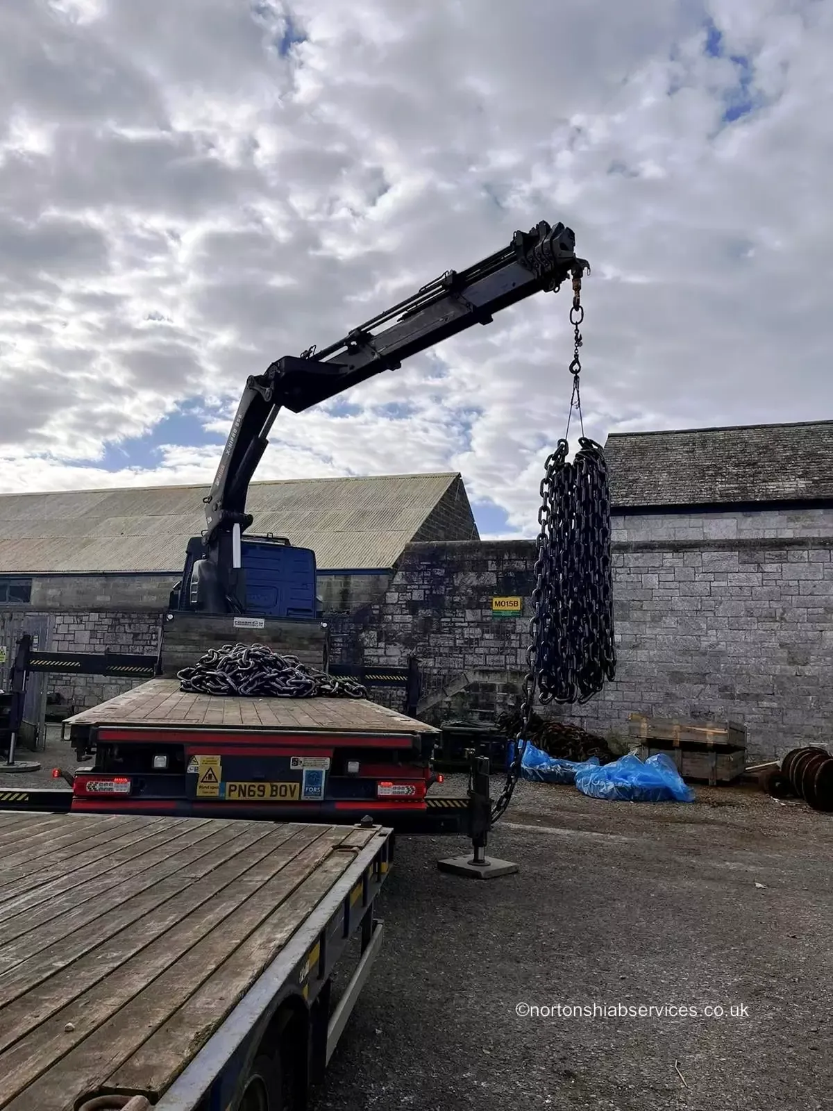 Chains and lifting gear on the deck of a Nortons rigid hiab lorry