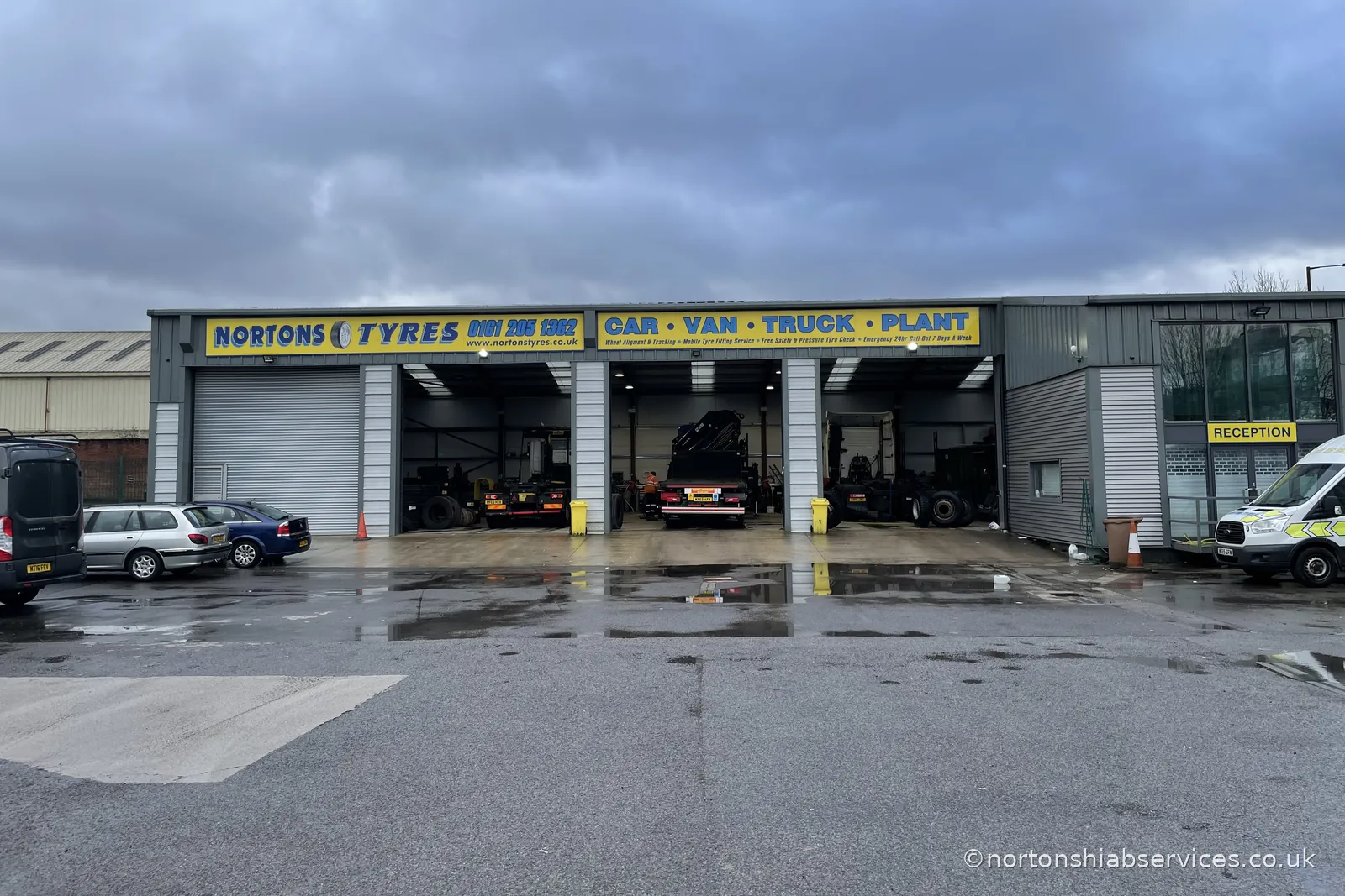 The Nortons Tyres depot on Norton Street in Manchester with all three fitting bays open