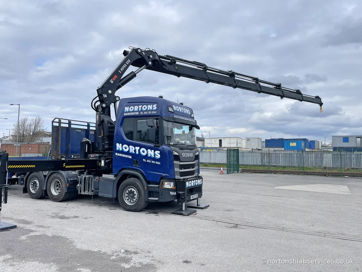 Euro VI Nortons tractor unit coupled to a step frame trailer