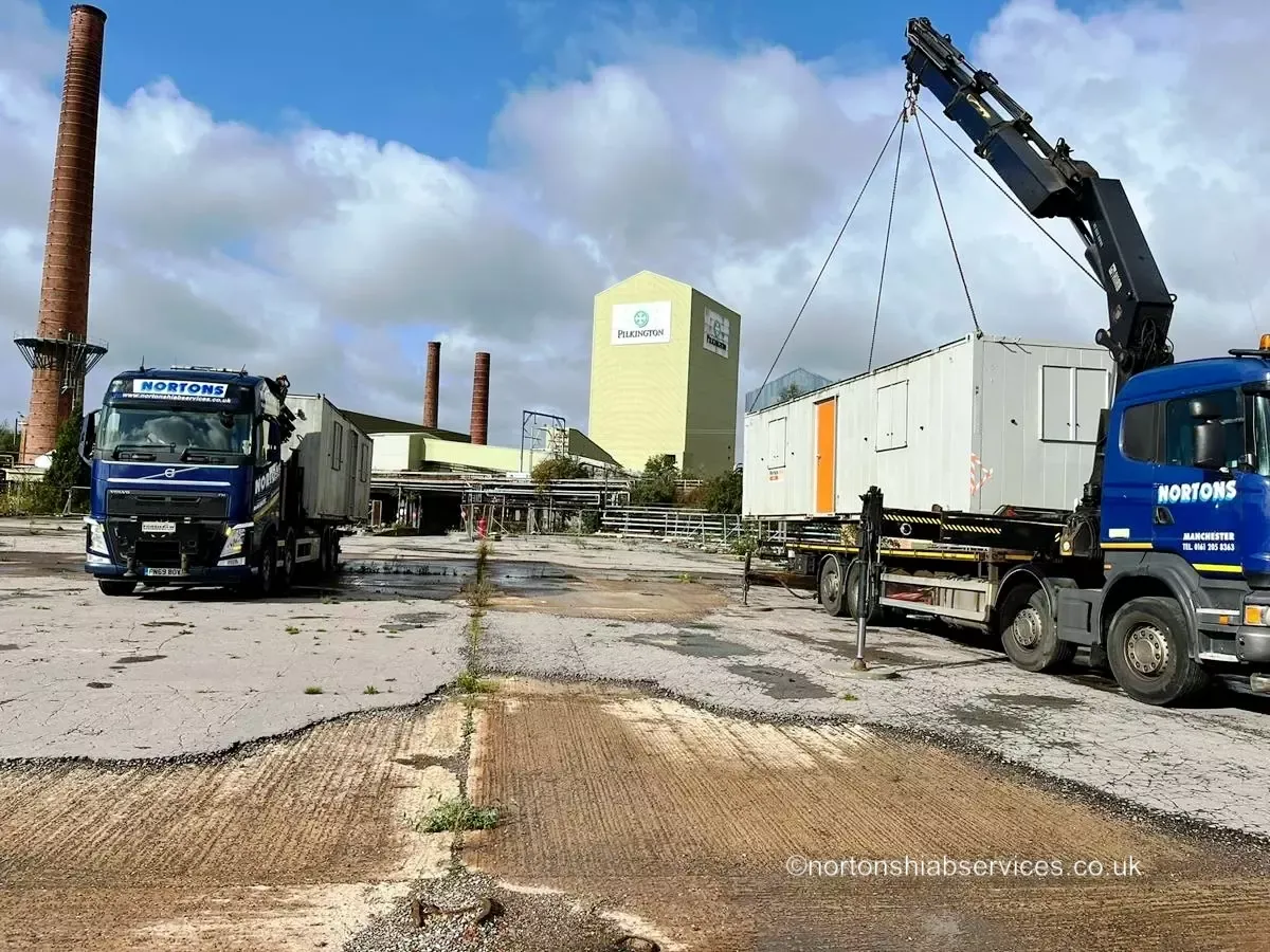 Nortons hiab moving a container between site compounds