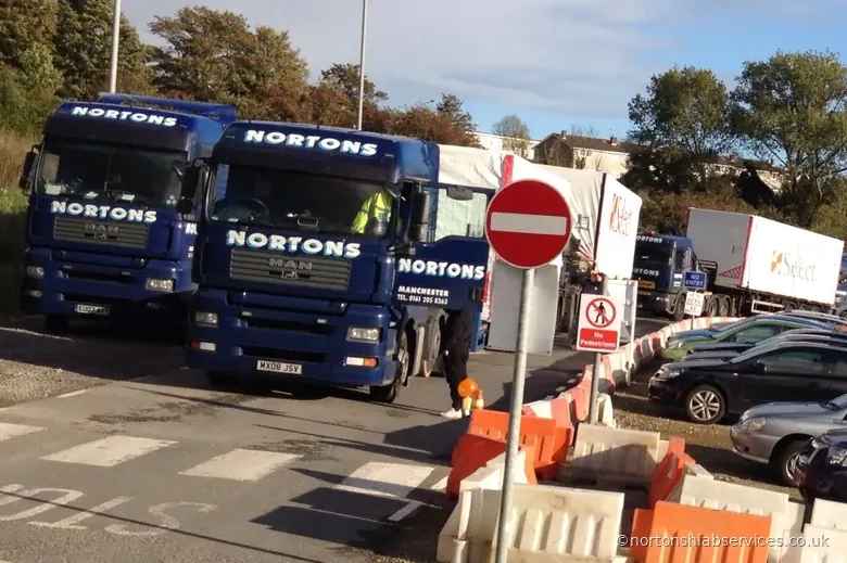 Several Nortons hiab lorries working together on one site