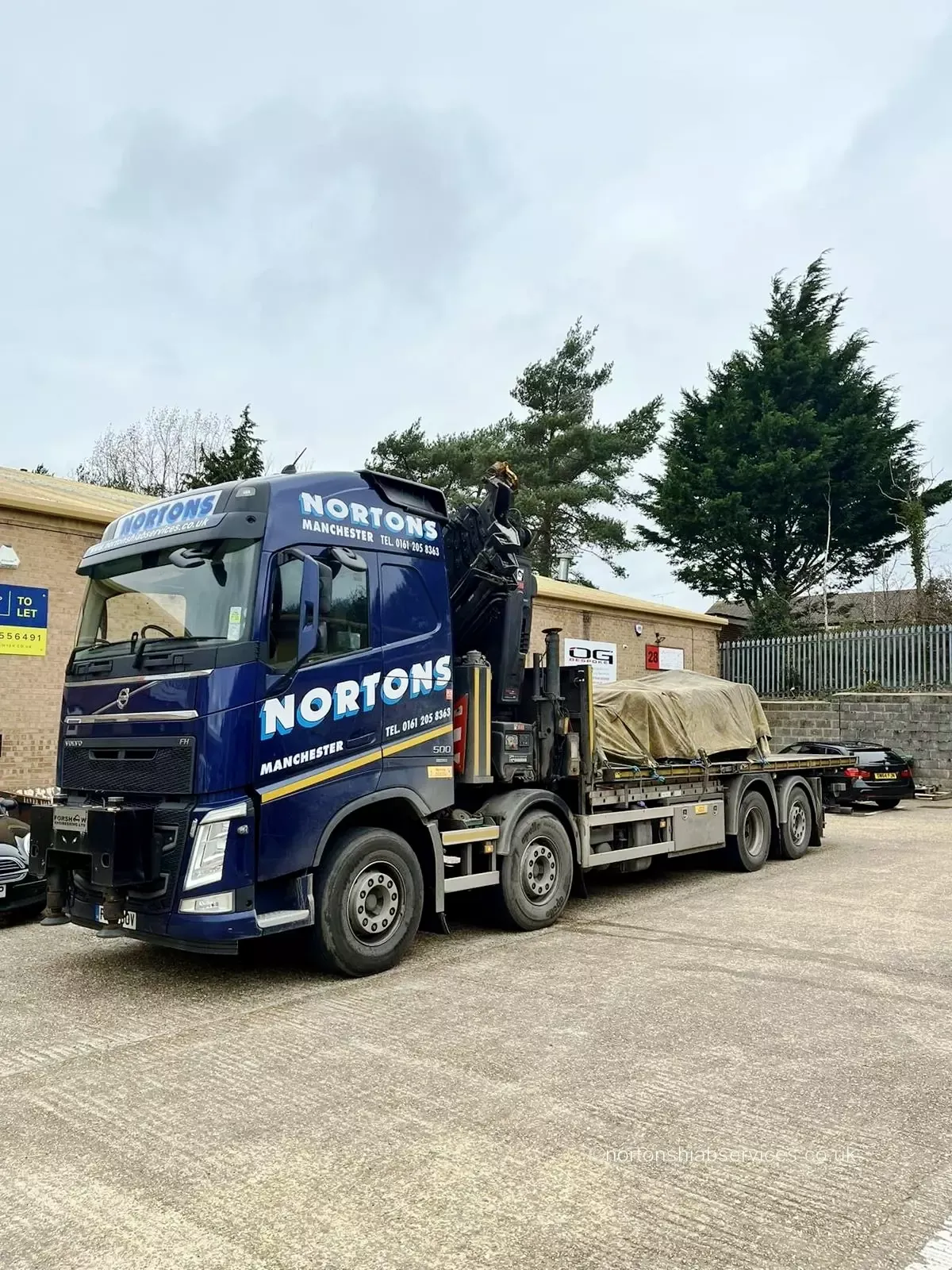 Nortons lorry loaded with palletised construction blocks