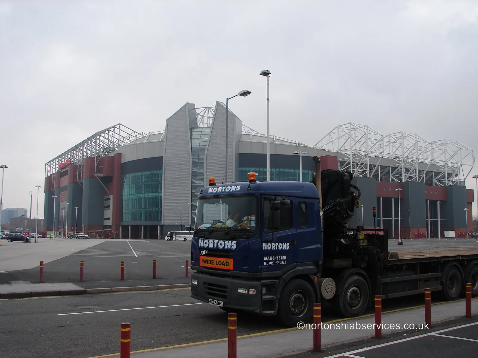Nortons hiab lorry working at the kerbside on a city road