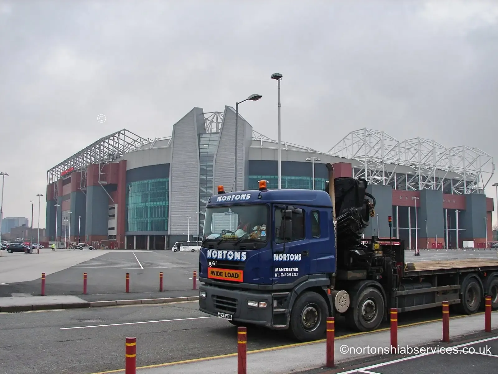 Nortons hiab lorry and driver / operator working at a stadium site