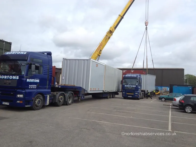 Nortons driver / operator loading a hiab lorry in the yard