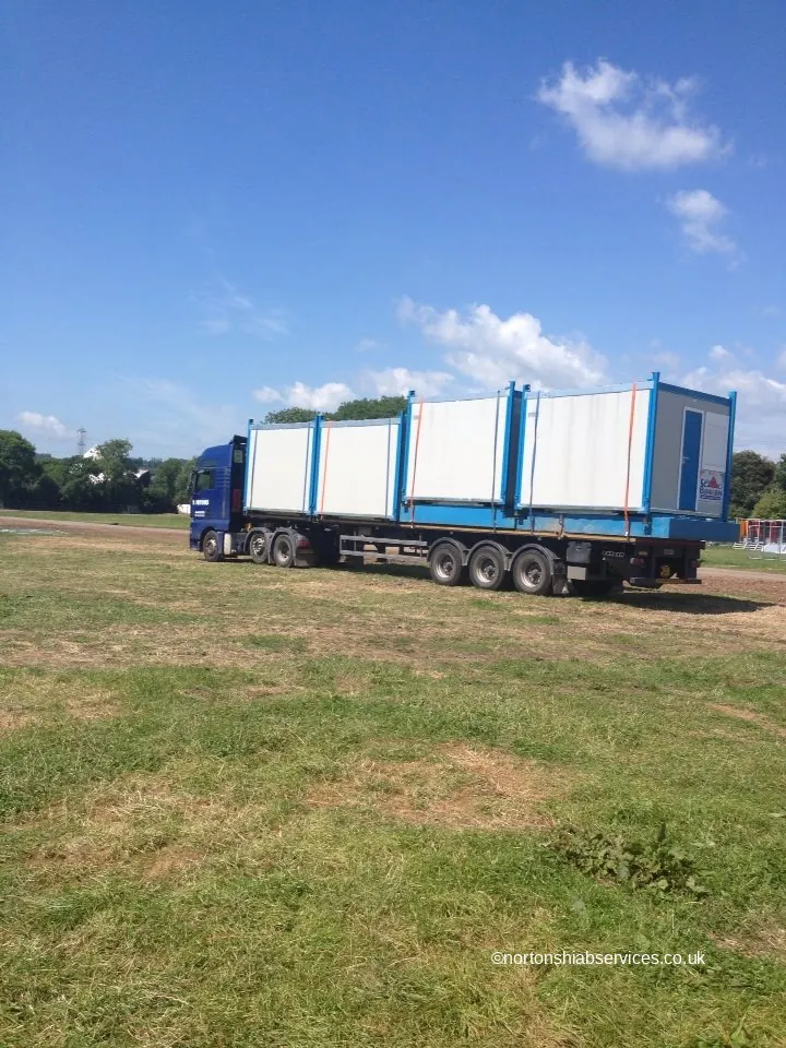 Site cabins loaded and strapped on a Nortons trailer ready for the run south