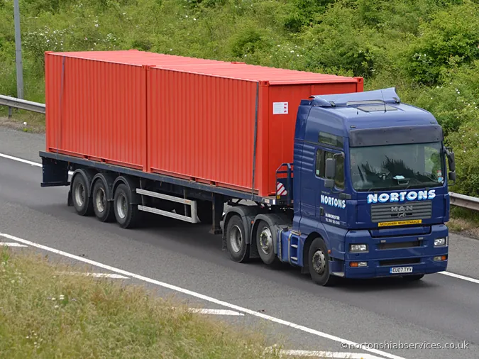 Nortons articulated lorry carrying two shipping containers on the motorway
