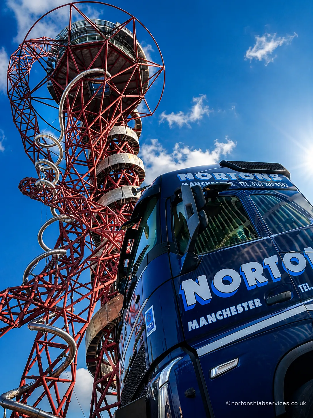 Nortons hiab lorry at Queen Elizabeth Olympic Park beside the ArcelorMittal Orbit