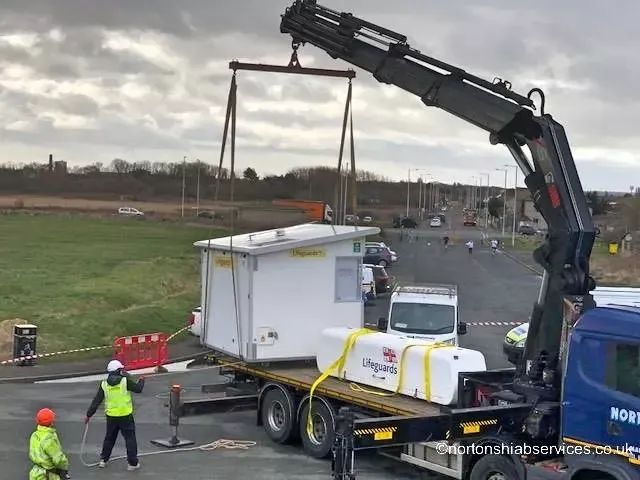 Nortons crew carrying out a planned cabin lift in high visibility clothing