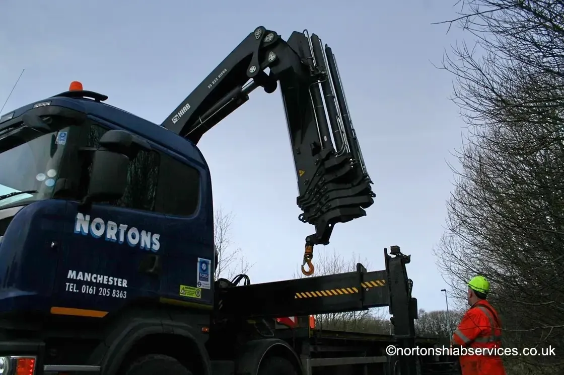 Nortons driver / operator working a hiab crane by remote control