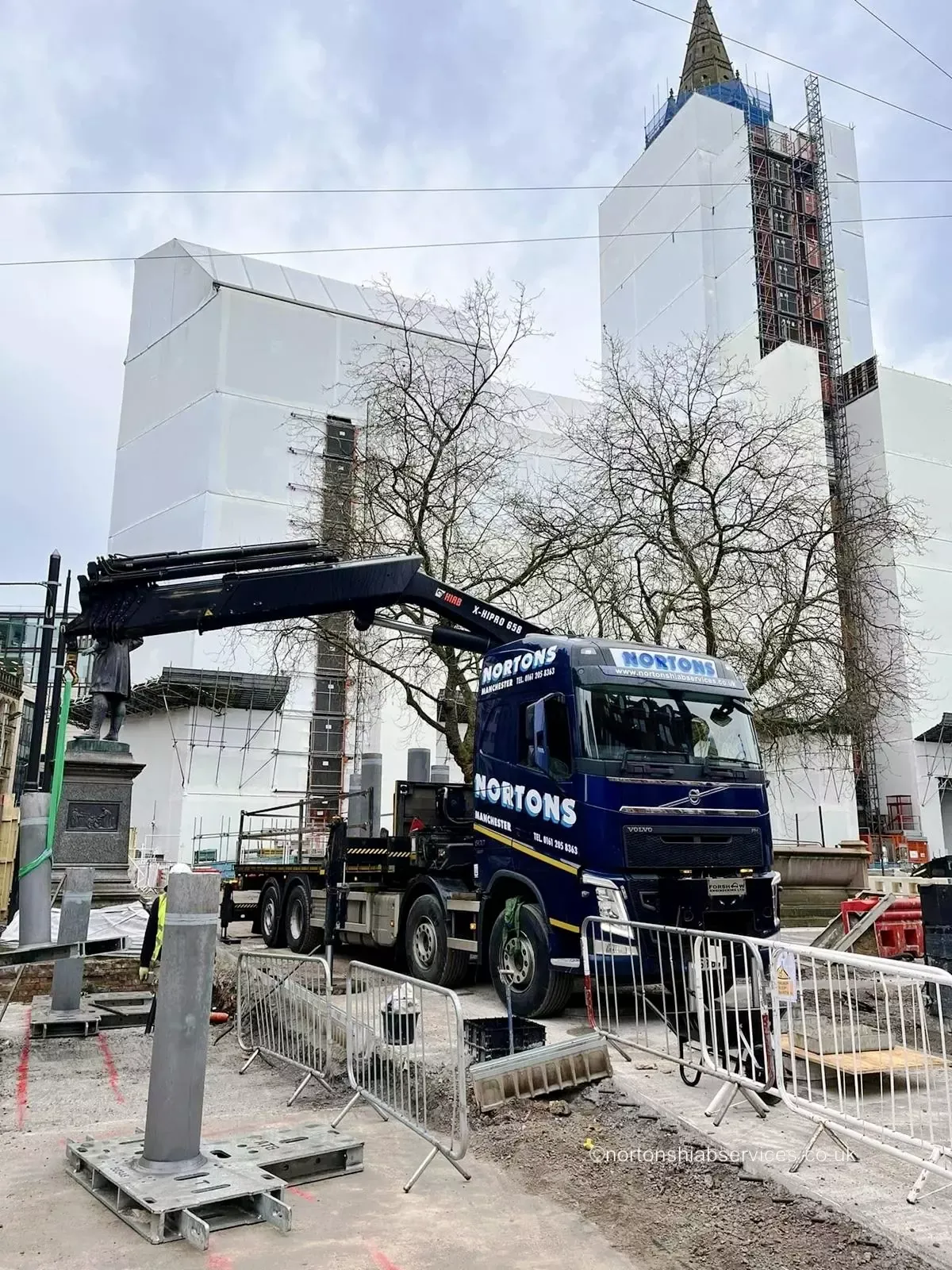 Nortons hiab lifting a large panel with the area below kept clear