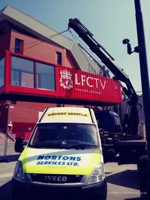 The studio unit held on the slings above a Nortons escort van at Anfield