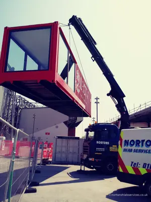 The studio unit swung clear of the lorry and turning towards its position