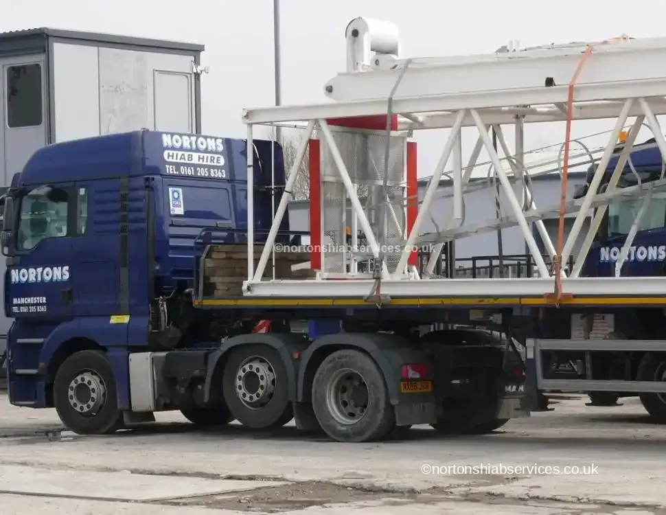 Tower crane mast sections loaded on a Nortons trailer