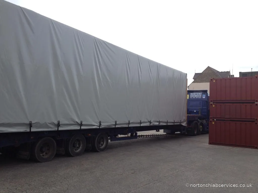 Nortons articulated trailer loaded with a long sheeted load