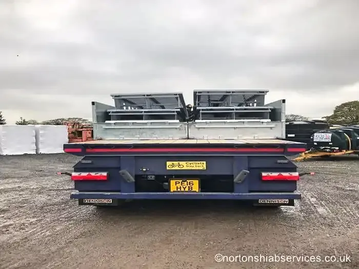Galvanised steelwork loaded on the low deck of a Nortons trailer