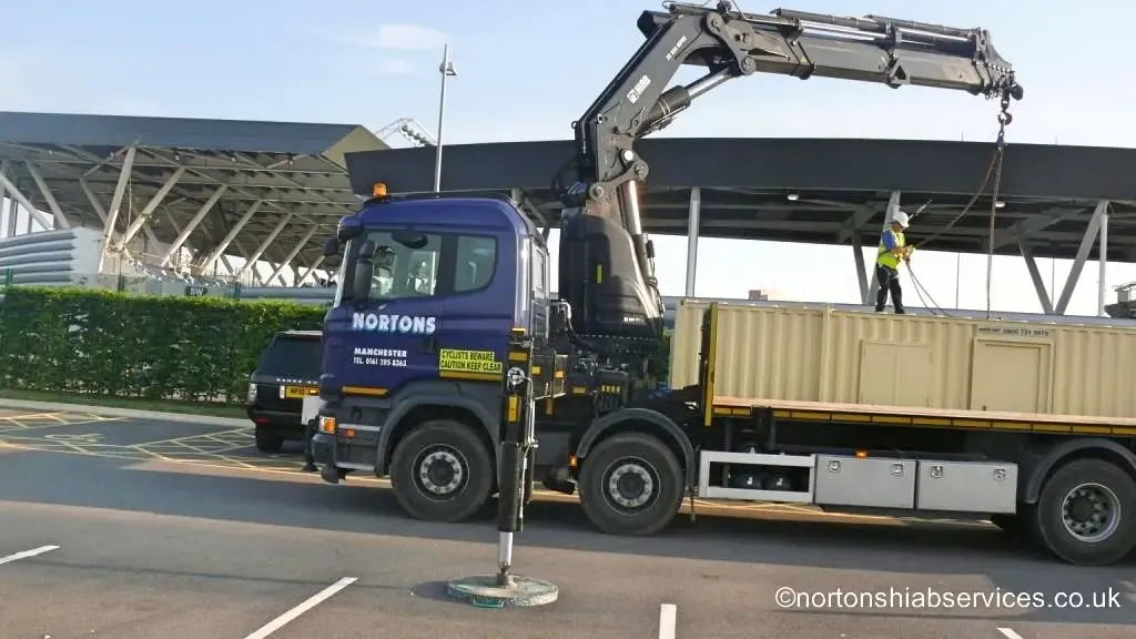 A Nortons flatbed loaded with timber for delivery to the Manchester City football academy site