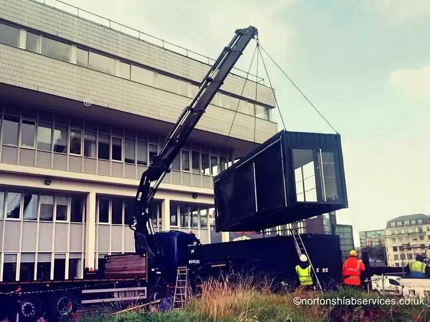 Nortons hiab installing a modular unit at Circle Square in Manchester