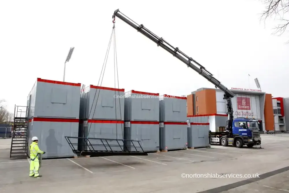 Nortons hiab stacking site cabins at the Emirates Old Trafford cricket ground