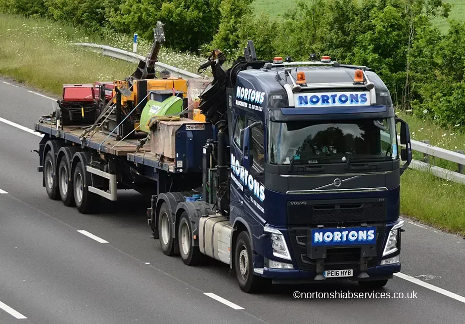 Nortons artic loaded with plant heading north on the M6 near Gretna