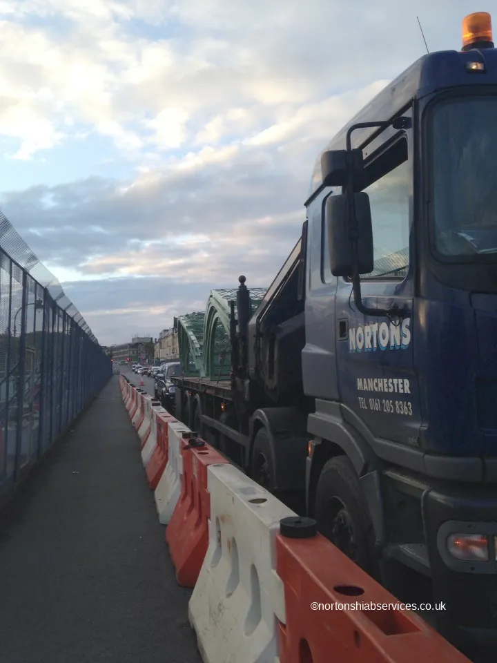 A Nortons lorry working alongside road barriers on a bridge repair at Scarborough