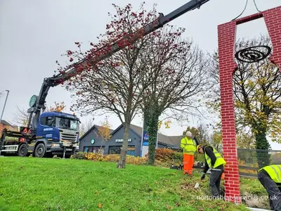 Nortons crew fixing down a public gateway column installed by hiab at Barnsley