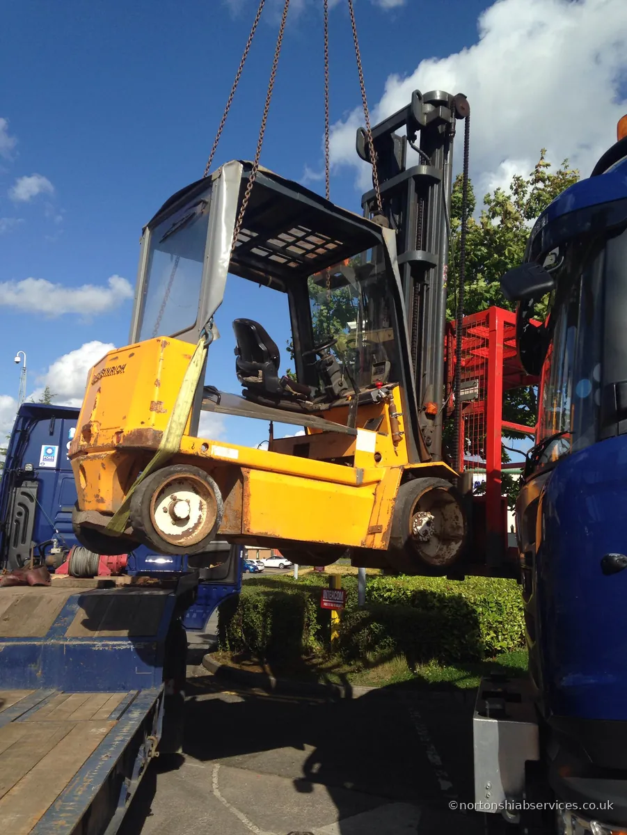 Nortons hiab loading a second machine at Risley