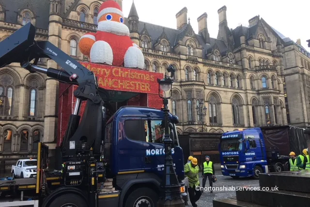Two Nortons hiab lorries working in Albert Square building the Manchester Christmas markets