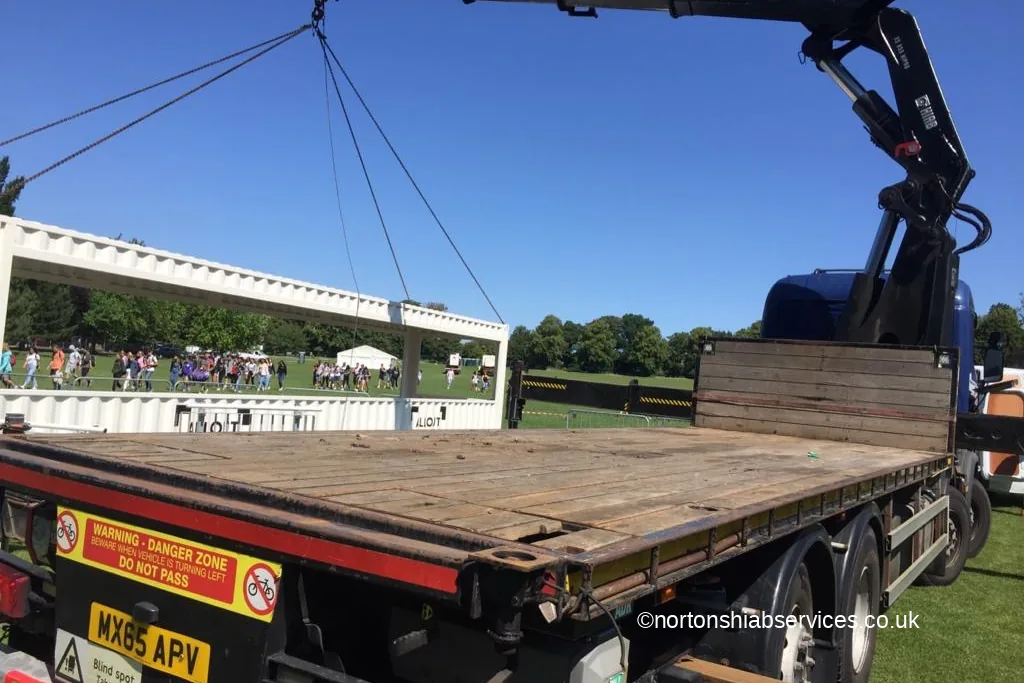 A structural frame lifted from a Nortons flatbed at the Brighton Festival site