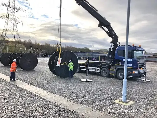 Nortons hiab lifting large cable drums on a contract lift at Tameside