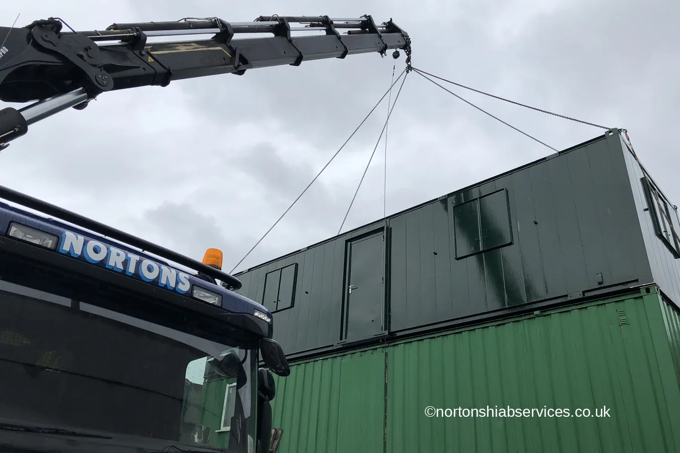 A triple-stacked site cabin set-up completed by Nortons at a waste management yard
