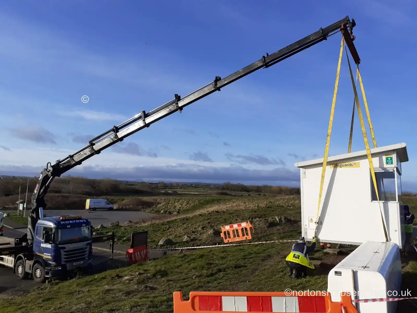 Nortons hiab installing a new RNLI lifeguard cabin at Birkenhead