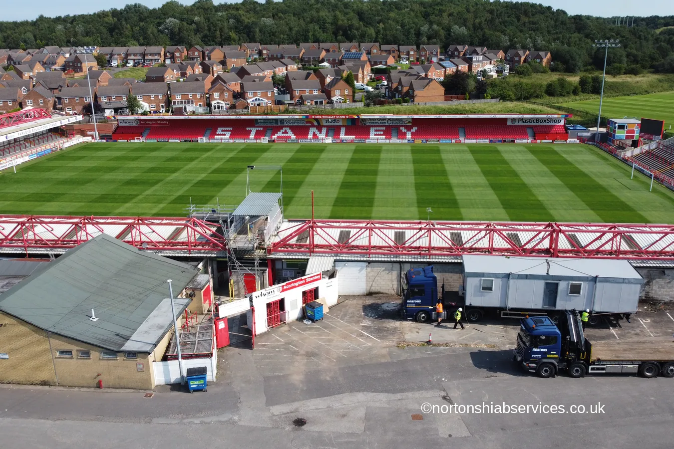 A Nortons 855 hiab and artic unit set up ready to lift at a football ground