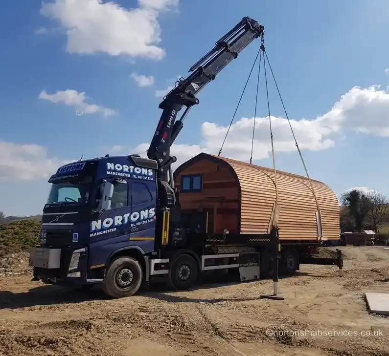 Glamping pods loaded on a Nortons trailer ready for delivery