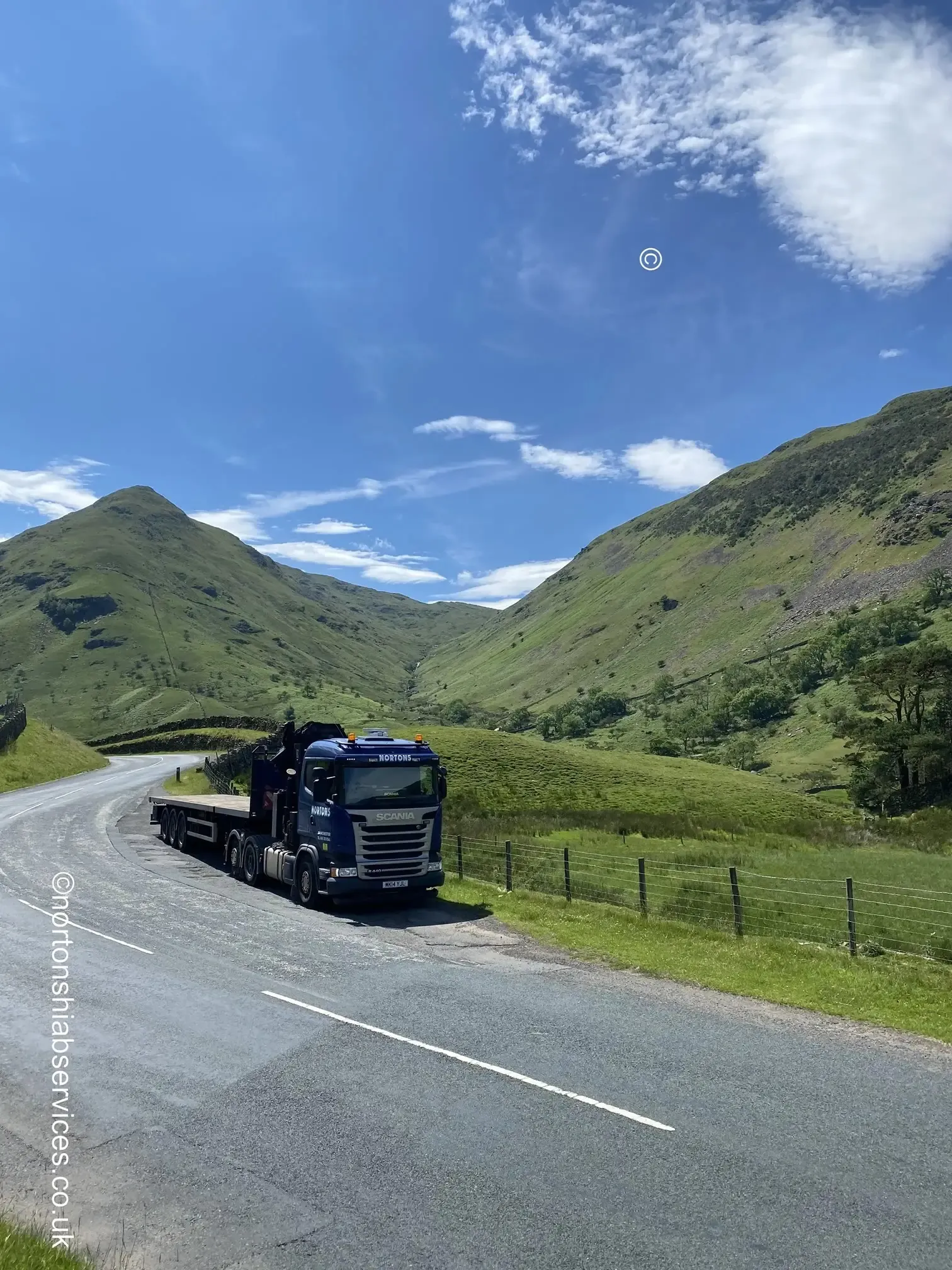 A Nortons lorry photographed on the road at Kirkstone Pass in the Lake District