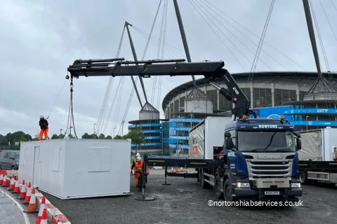 Site accommodation units being lifted at the Etihad Stadium in Manchester