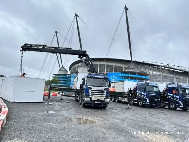 Nortons hiab working with the boom out beside the Etihad Stadium in Manchester
