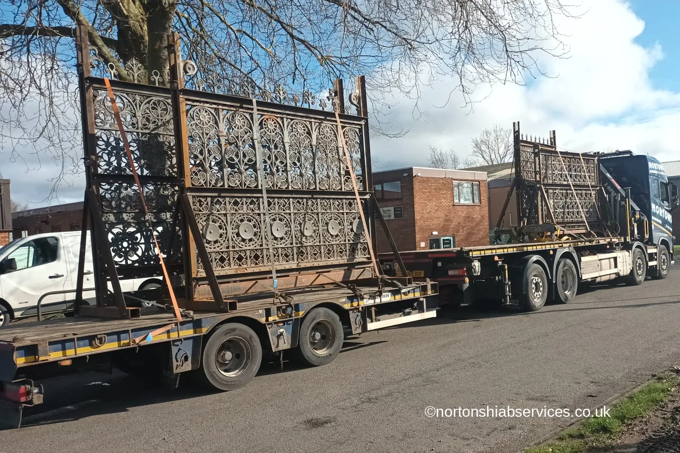 Ornate iron gates from Manchester Town Hall loaded on a Nortons wagon and drag