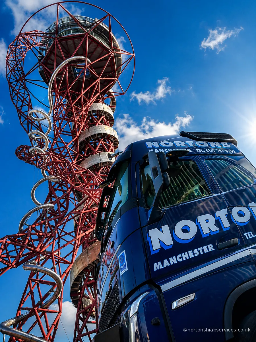 A Nortons hiab lorry on site beneath the Orbit tower at Queen Elizabeth Olympic Park in London