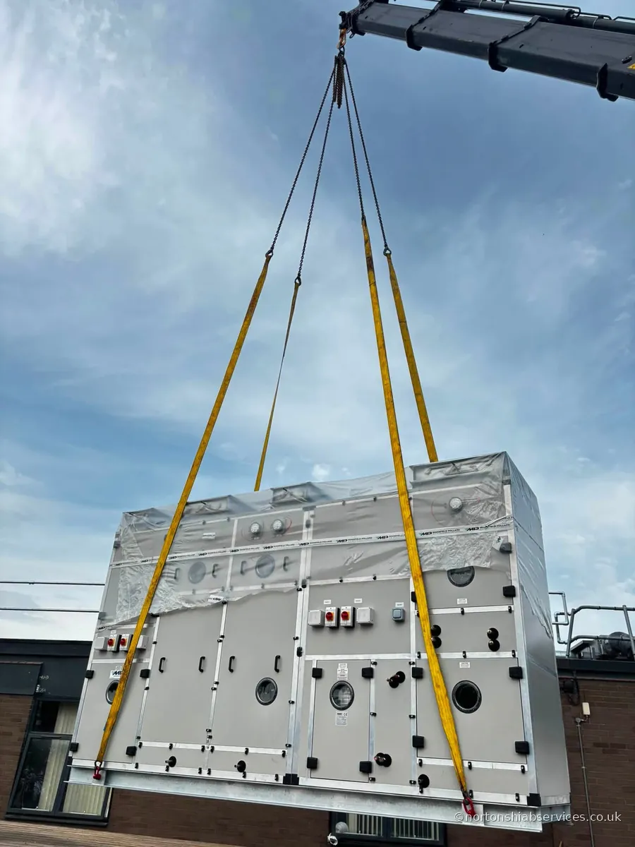 A Nortons hiab lifting a large packaged plant unit on slings at Royal Shrewsbury Hospital