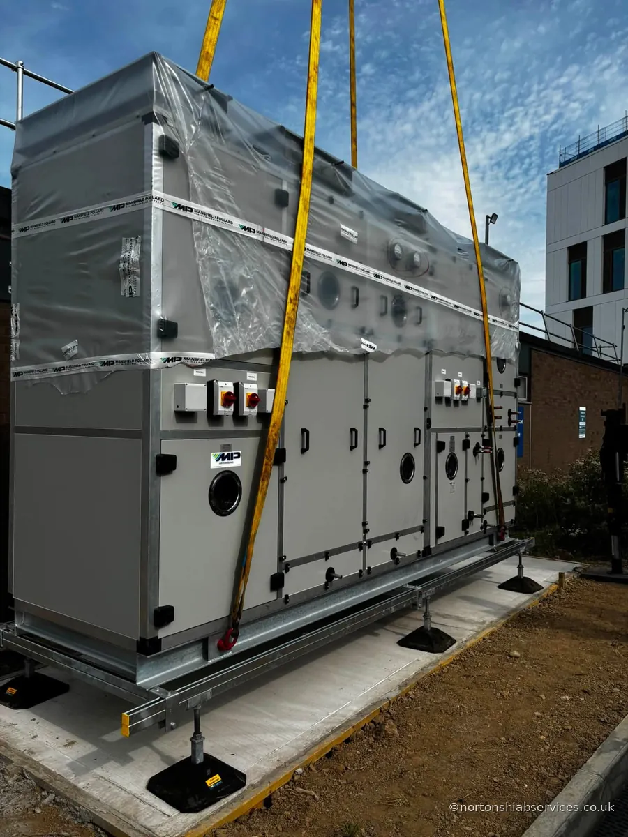 A large packaged plant unit set down on its galvanised base outside Royal Shrewsbury Hospital with the lifting slings still attached
