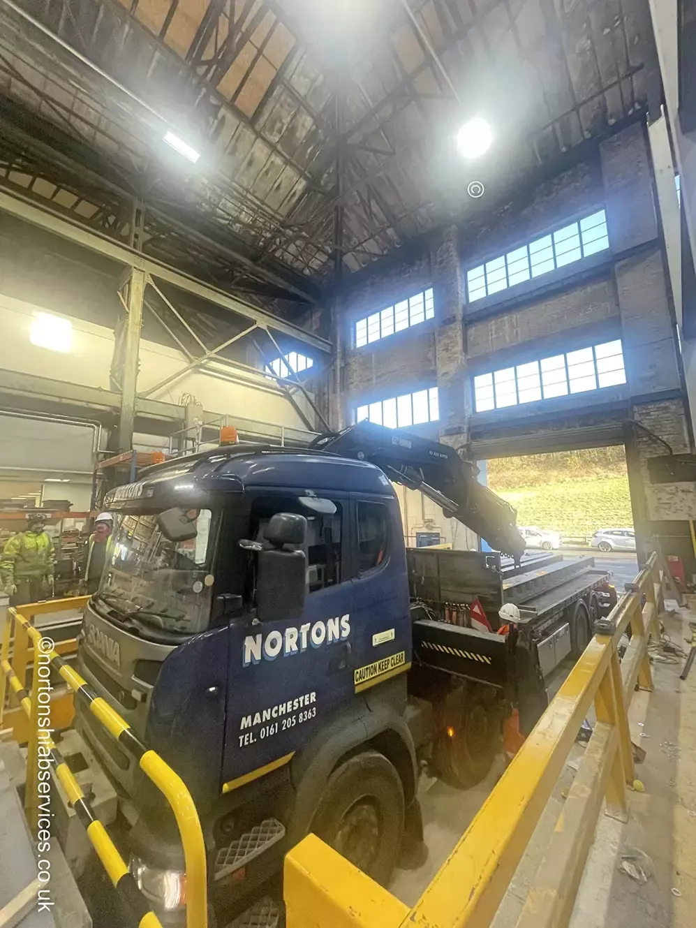 Machine being positioned inside a building by Nortons