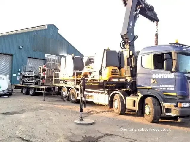 Plant machine loaded on a Nortons trailer for a long distance move