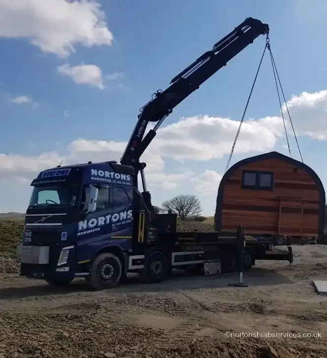 Glamping pod being set down onto its prepared base