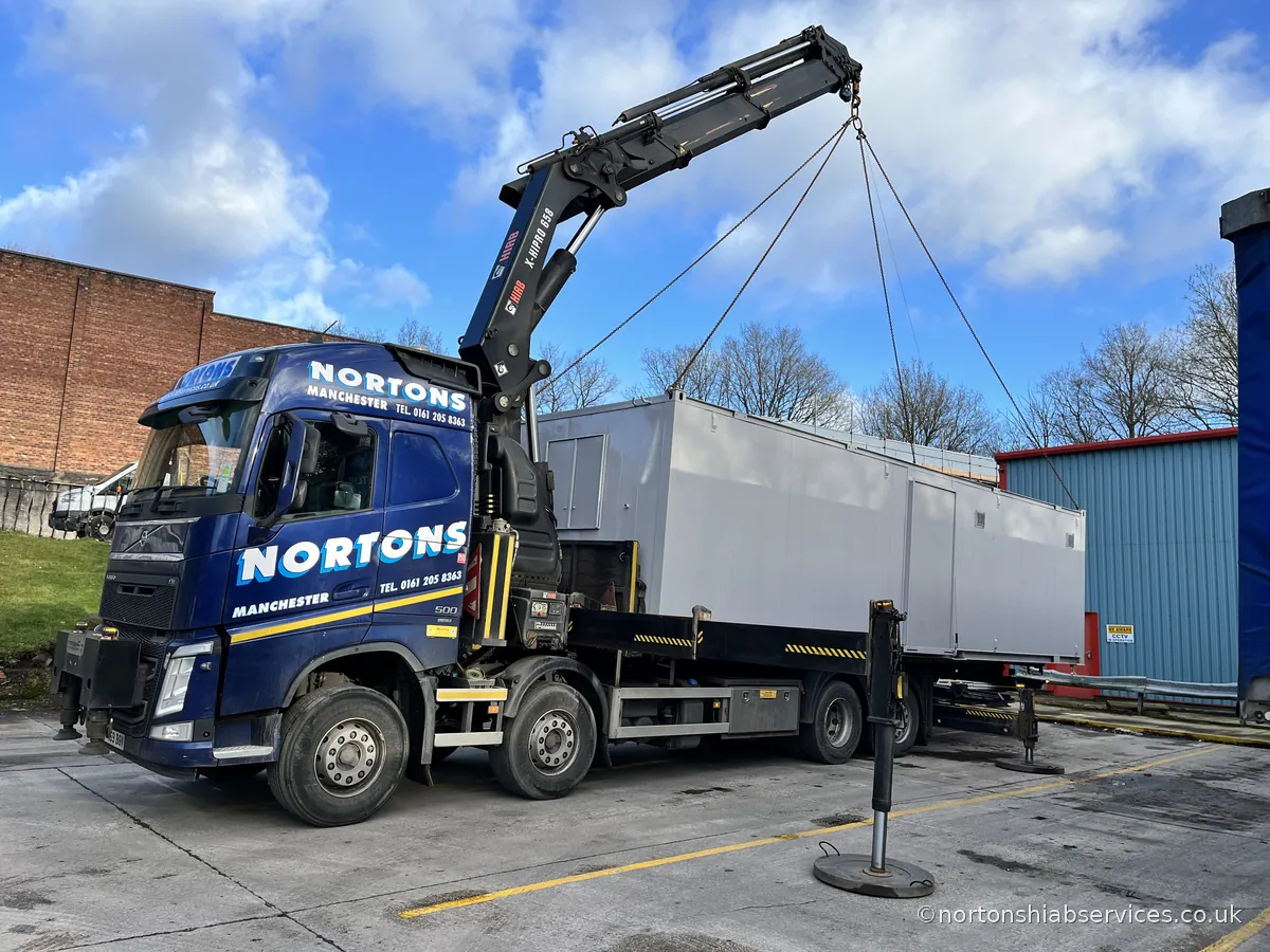 A refurbished portable cabin set up on site after delivery by Nortons