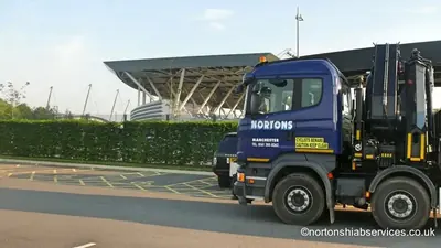 Nortons hiab parked alongside the academy development between lifts